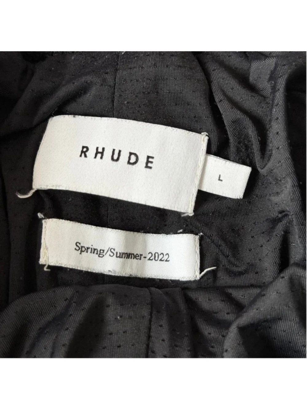 Rhude blue shorts with white lettering spelling 'RHUDE ' and white/black trim, s